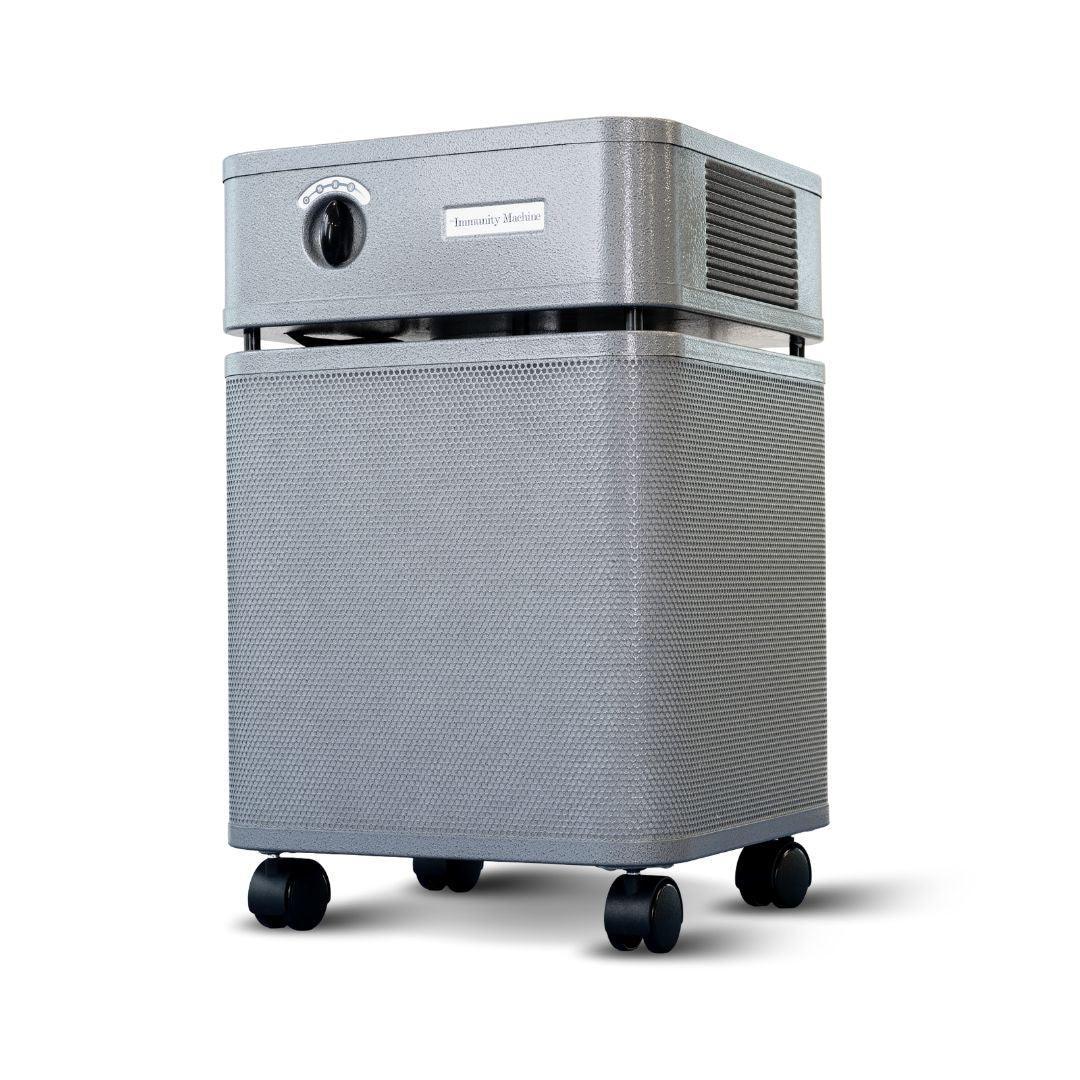 Austin Air graphite air purifier with control knob, vent, and caster wheels, left side view
