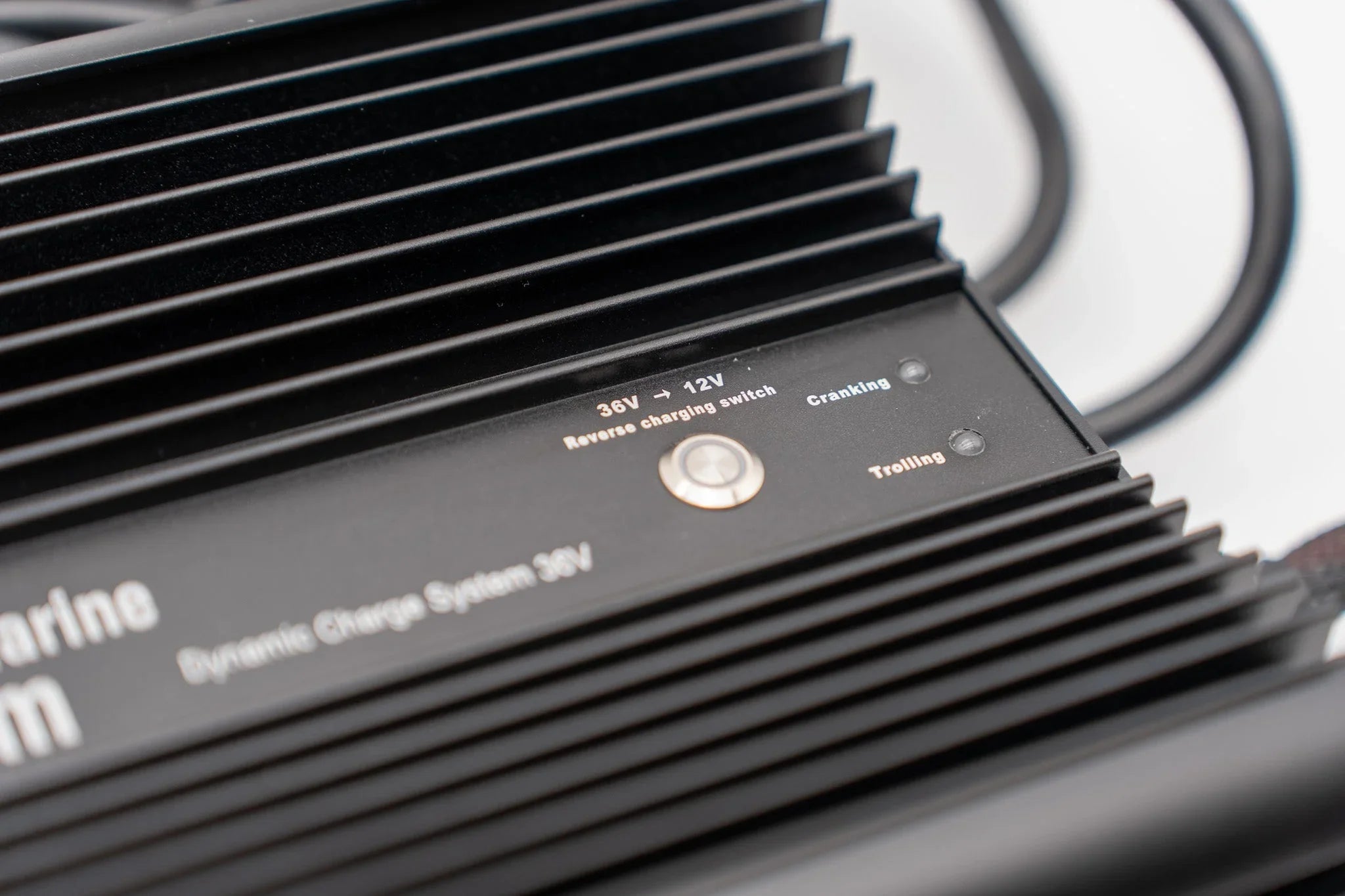 Dynamic charge system close-up showing 36V to 12V reverse charging switch and indicator lights