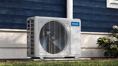 MRCOOL outdoor air conditioner condenser unit installed beside blue house wall