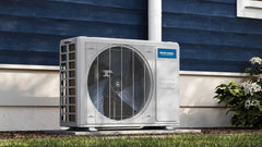 MRCOOL outdoor condenser unit installed beside a house, HVAC system for heating and cooling