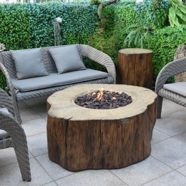 Manchester fire pit table set with wicker patio furniture on outdoor tiled terrace