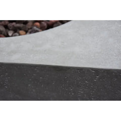 OFG104 Metropolis close-up of modern concrete fire pit edge with lava rocks