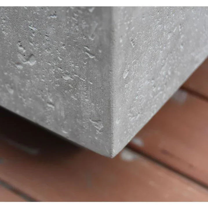 OFG104 Metropolis fire table close-up showing concrete corner texture on wood deck