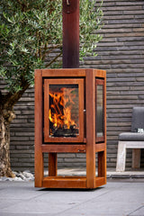 RB73 Quaruba XXL MOBILE 4-Sided Glass Warm Brown CorTen Steel Wood-Burning Outdoor Fireplace