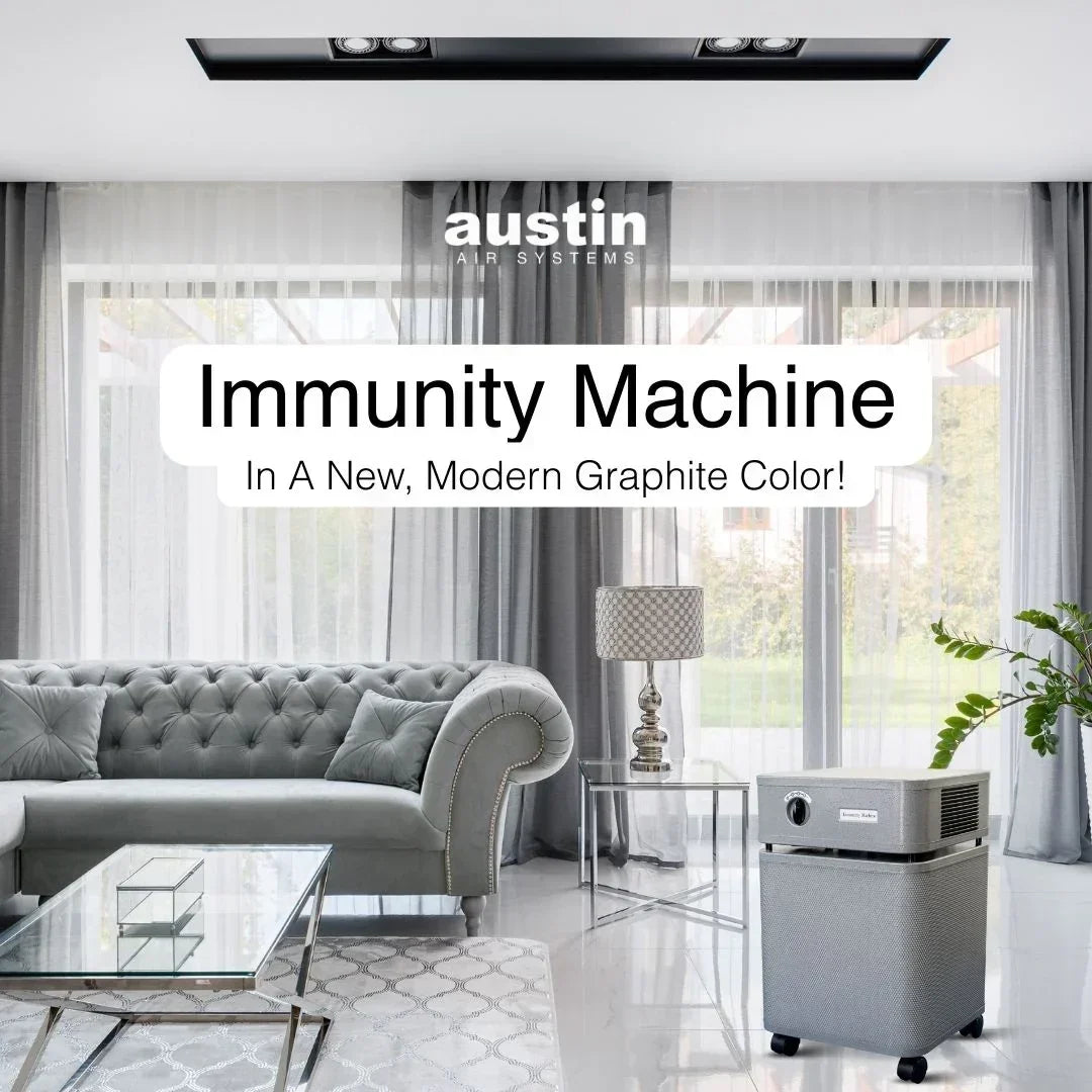 Austin Air graphite gray air purifier with 8-phase filter in modern living room