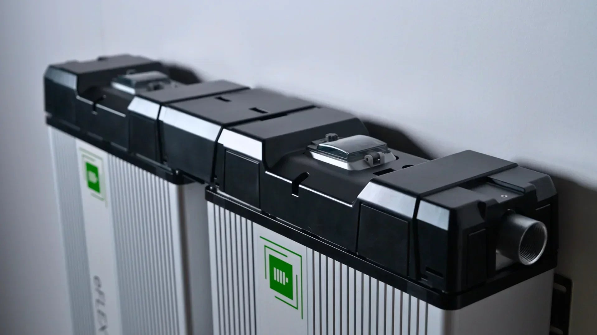 eFlex Max connected lithium battery system with black and silver casing, wall mounted