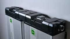 eFlex Max connected lithium battery system with black and silver casing, wall mounted