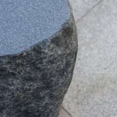 Elementi Boulder tank cover with textured stone finish, corner detail view