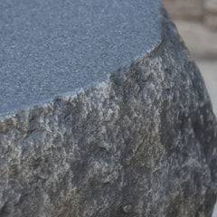 Elementi Boulder tank cover side corner with textured stone finish and smooth top detail