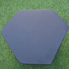 Elementi black hexagonal seat accessory on green artificial grass