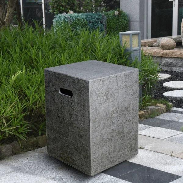 Elementi Manhattan or Hampton tank cover on modern outdoor patio with greenery