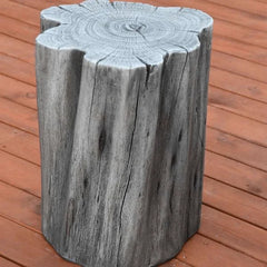 Elementi Warren seat in classic grey, wood-look stool on outdoor deck