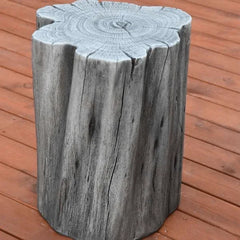 Elementi Warren seat in classic grey, wood-look stool on outdoor deck