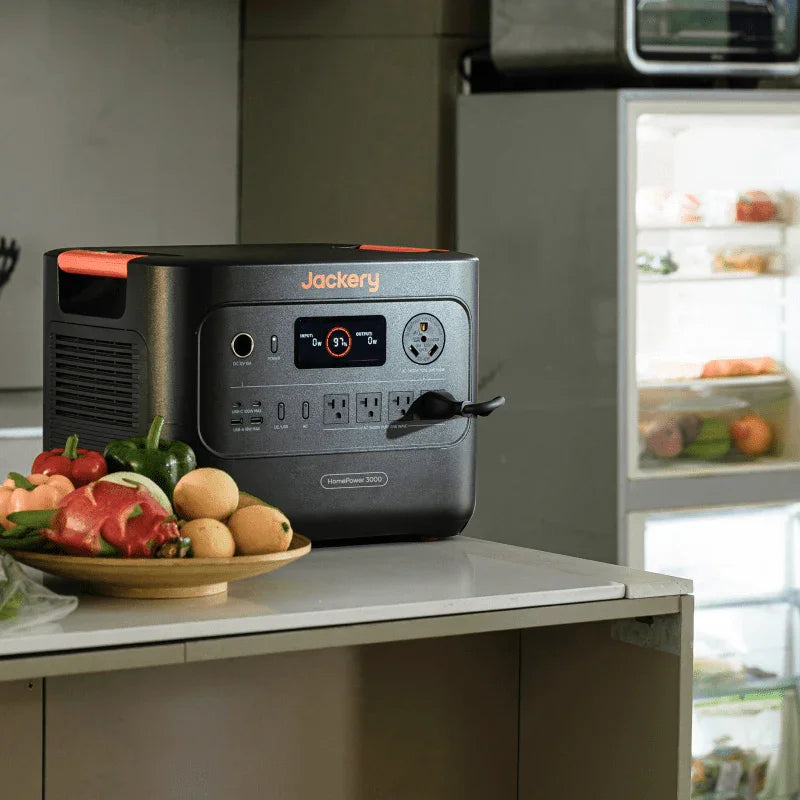 Jackery HomePower 3000 portable power station on kitchen counter with appliances and vegetables