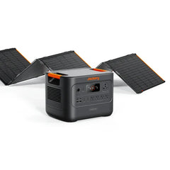 Jackery portable power station with foldable solar panels, black and orange design