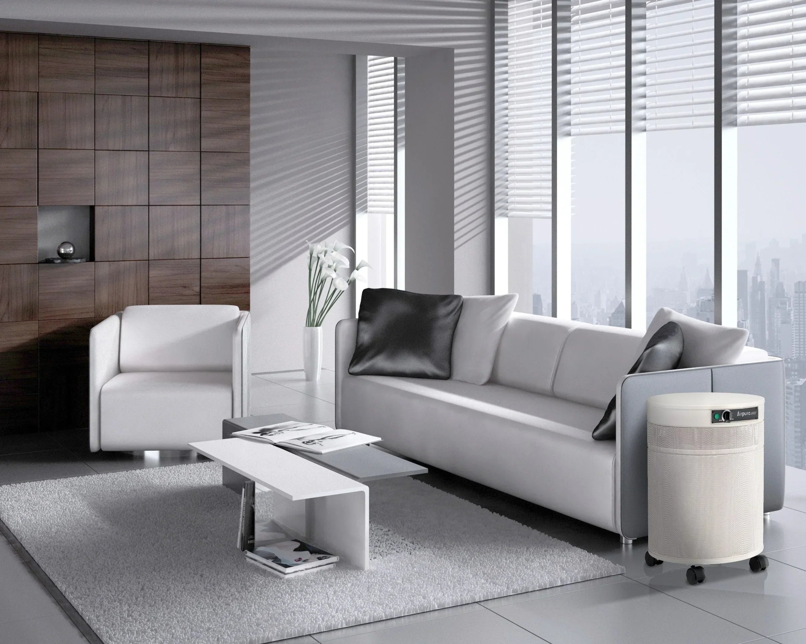 Airpura air purifier in modern living room with white sofa, armchair, and city view windows