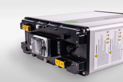 Inverter unit with warning label, control panel, ports, and silver-black casing on white background