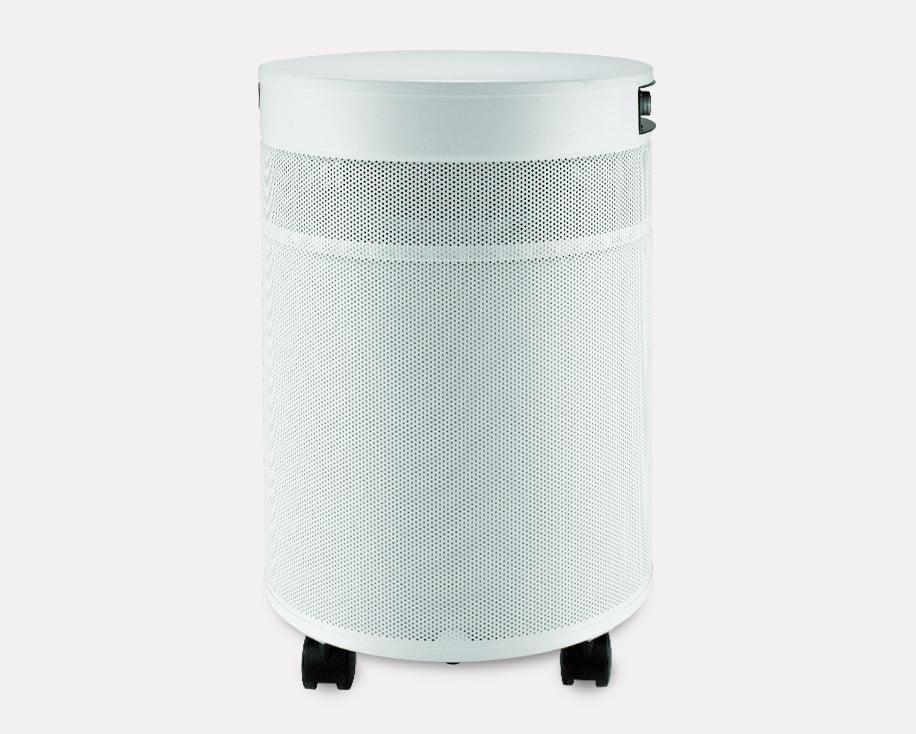White portable air purifier with perforated metal body and wheels for easy movement
