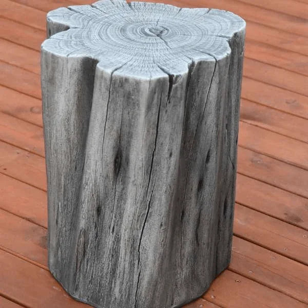 Elementi Warren seat in classic grey, wood-look stool on outdoor deck